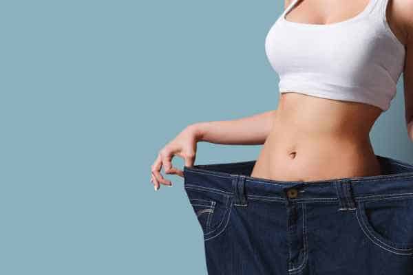 woman after fat reduction treatment Bridgend