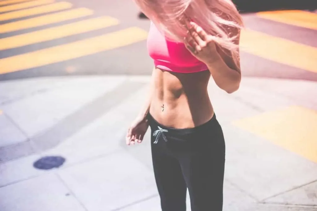 Woman with toned stomach after LA-EMS Body Sculpting Treatment Bridgend
