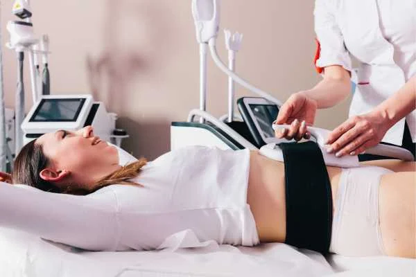 woman having body sculpting to help improve her body image and her mental health Bridgend